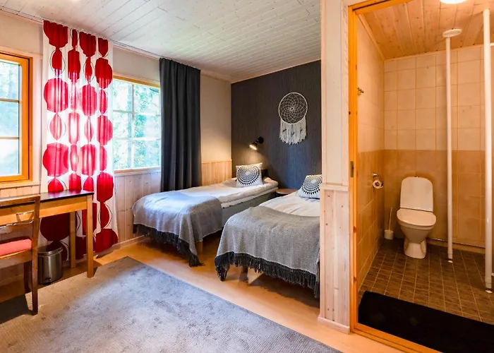 Hotelli Isokenkäisten Klubi - Wilderness Kiviperä