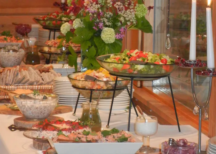 Isokenkäisten Klubi - Wilderness Hotelli Kiviperä