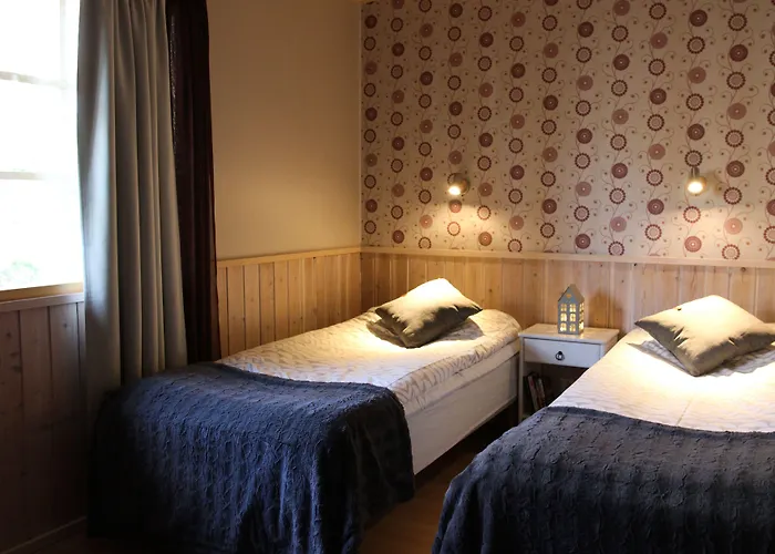 Hotelli Isokenkäisten Klubi - Wilderness Kiviperä